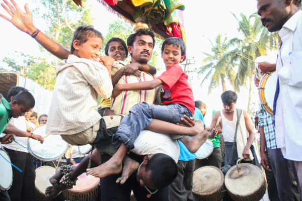 This performer was carrying one man and three children along with Pallakki